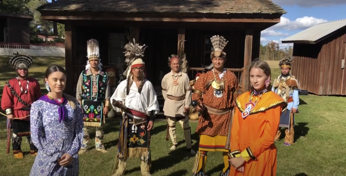A photograph of a gathering of individuals belonging to the same tribal community